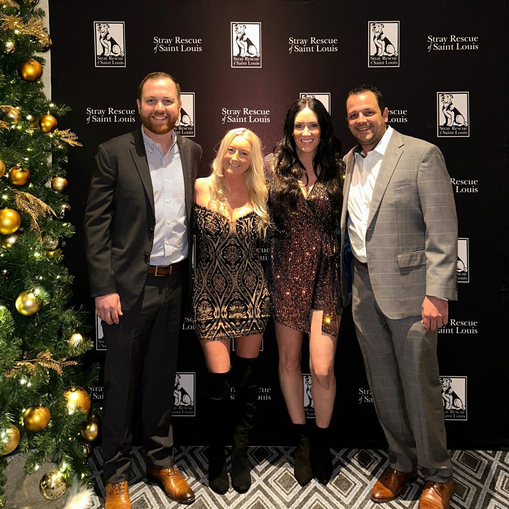 DRC Supporting Stray Rescue of Saint Louis Photographed left to right: DRC Vice President of Operations Mike Kalamitsiotis with his wife Madeleine, Lindsey Hammer alongside her fiancé David Francosky, Fixed Operations Director at Asbury Automotive Group